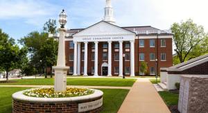 The great commision center behind the light pn the hill