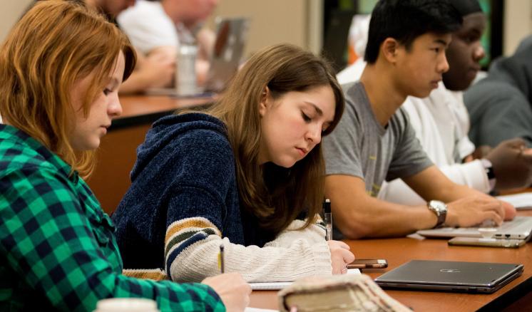img_1 During the Introduction to New Testament Mini-Term with Assistant Professor of Religion Jeremy Greer, junior Chloe Wright, freshman Lauren House, and freshman Eric Hood take notes.